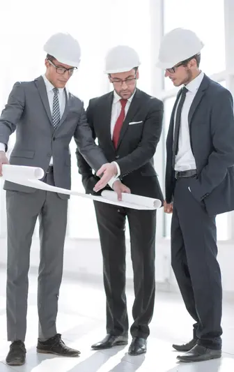 Architects reviewing blueprints – Architect Pro Dallas